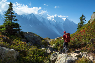 a man hiking on the famous tour du mont blanc near chamonix, france.