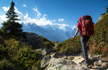 a man hiking on the famous tour du mont blanc near chamonix, france.