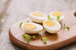 Boiled eggs on cutting board. Selective focus, space for text