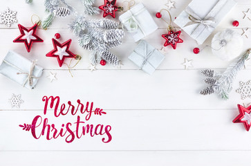 Wall Mural - christmas composition, congratulation in light colors. christmas gift, fir branches and cones, stars