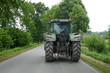 © anela47 - Tractor from behind, on a lonely country road