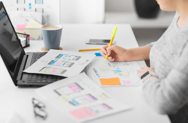 Wall Mural - app design, technology and business concept - web designer or developer with sketches and laptop com