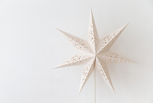Close Up Of Vintage White  Lantern With Star Shape On Empty Wall.