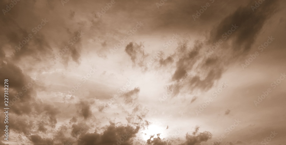 Dramatic clouds with sepia filter - obrazy, fototapety, plakaty 