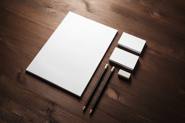 Wall Mural - Blank corporate stationery set on wood table background. Template for branding identity.