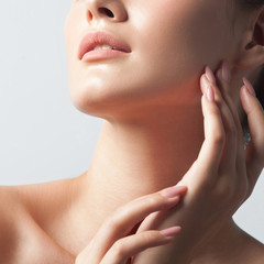 young beautiful woman with clean perfect skin with cosmetic patches on face close-up