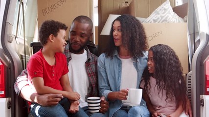 Poster - Family Sitting In Back Of Removal Truck On Moving Day