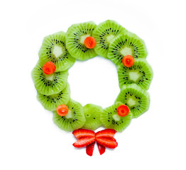 Wall Mural - Kiwi strawberry Christmas wreath isolated on white background