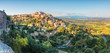 French medieval town in Provence - Gordes. Beautiful panoramic view on medieval town Gordes in sunset light.