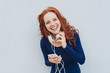 © contrastwerkstatt - Happy woman laughing while looking at camera