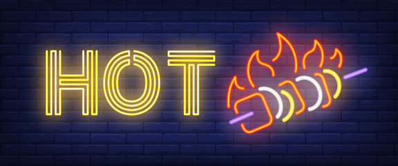 Wall Mural - Hot neon sign. Kebab and fire flame on brick wall background. Vector illustration in neon style for barbecue restaurant, picnic, bar