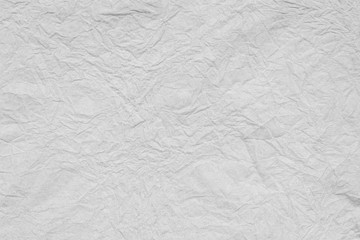 Crumpled white paper texture background. Recycle blank page creased material or sheet.