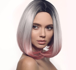 Ombre bob short hairstyle. Beautiful hair coloring woman. Trendy haircuts. Blond model with short shiny hairstyle. Concept Coloring Hair. Beauty Salon.