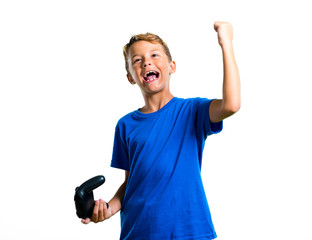 Wall Mural - A full-length shot of Lucky kid playing the console on isolated white background