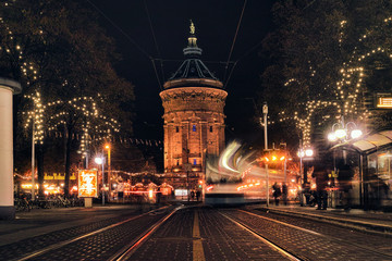 Time Exposure train traffic light night Mannheim street public transport christmas holiday shopping water tower dark