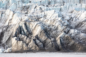 Wall Mural - isfjorden glacier front of blue ice in svalbard on a summer day.