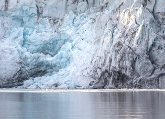 Wall Mural - isfjorden glacier front of blue ice in svalbard on a summer day.