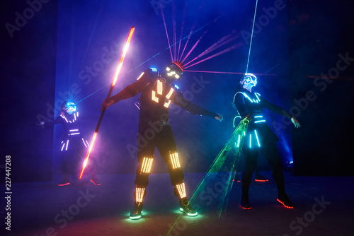 Laser Show Performance Dancers In Led Suits With Led Lamp Very Beautiful Night Club Performance Party Kaufen Sie Dieses Foto Und Finden Sie Ahnliche Bilder Auf Adobe Stock Adobe Stock