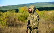 © be free - Hunting season. Man bearded hunter with rifle nature background. Experience and practice lends success hunting. How turn hunting into hobby. Guy hunting nature environment. Masculine hobby activity
