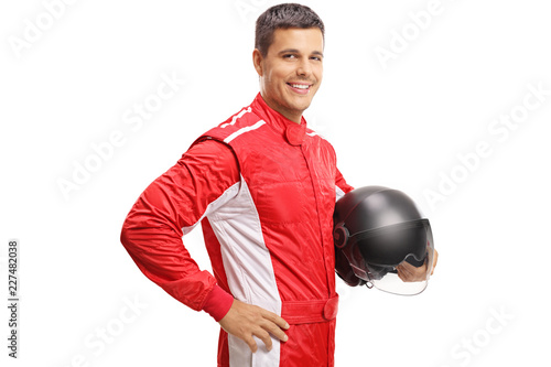 Fotografía Racer holding a helmet and smiling