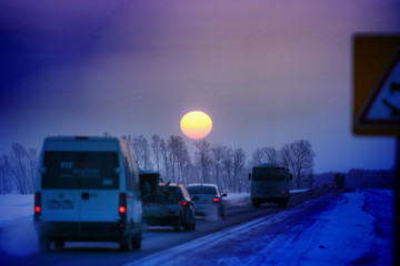 Dawn over the road in Siberia