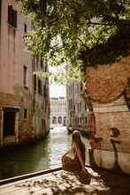Traveling Woman In Venice Italy With Long Hair