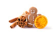 © Floydine - Gingerbread man with cinnamon sticks and dried orange slice isolated on white background