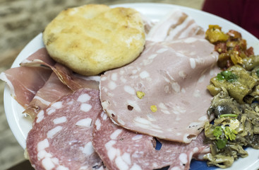 Wall Mural - delicious Italian salami served on a plate