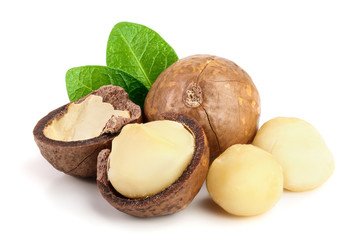 Poster - Shelled and unshelled macadamia nuts with leaves isolated on white background