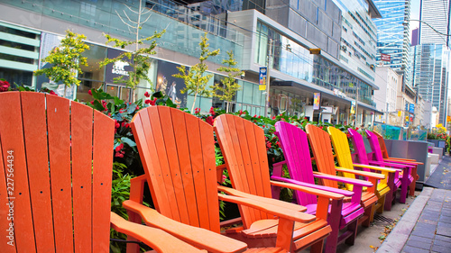 Cuadros en Lienzo Toronto, Canada-12 October, 2018: Colorful chairs on King street in front if TIF