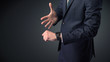 © ra2 studio - Man wearing suit with smartwatch on his wrist.