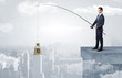 © ra2 studio - Businessman fishing sack of currency from the cityscape concept