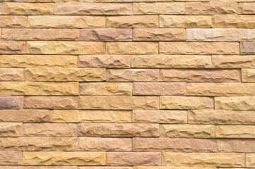 Beautiful yellow stone wall background