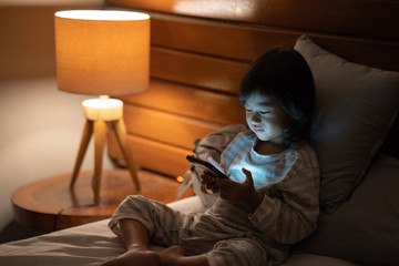 little girl with a smartphone