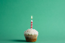 Birthday Cupcake On A Green Background