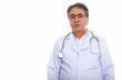 © Ranta Images - Studio shot of senior Persian man doctor