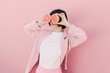 © villadsendiane/Stocksy - Girl in pink with grapefruit