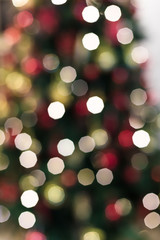 new year's background a bokeh from sparks illumination on a fir-tree