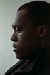 © danilnevsky/Stocksy - Profile of black serious man