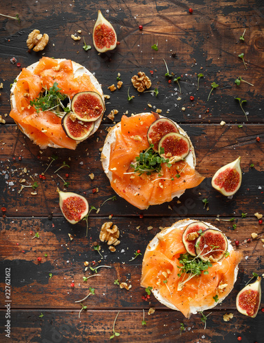 Salmon Bagel Sandwich With Figs Cress Salad Walnuts Cream Cheese And Grain On Rustic Wooden Background Healthy Breakfast Buy This Stock Photo And Explore Similar Images At Adobe Stock Adobe Stock
