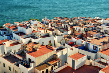 Wall Mural - Aerial view of Peninsula town with harbour and marina , Costa del Azahar, province of Castellon, Valencian Community. Peniscola is a popular tourist destination in Spain. View from the castle. 