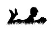 © majivecka - Vector silhouette of boy read book in the grass on white background.