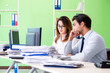 © Elnur - Two colleagues working in the office