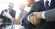 © ASDF - handshake of business partners in conference room