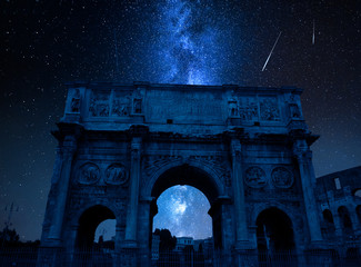 Wall Mural - milky way with falling stars over triumphal arch, rome, italy