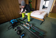© .shock - skier preparing ski accessories