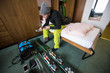 © .shock - skier preparing ski accessories