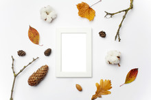 Autumn Photo Frame, Dried Flowers And Leaves On White Background. Flat Lay, Top View, Copy Space