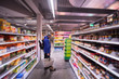 © .shock - Man shopping in modern supermarket