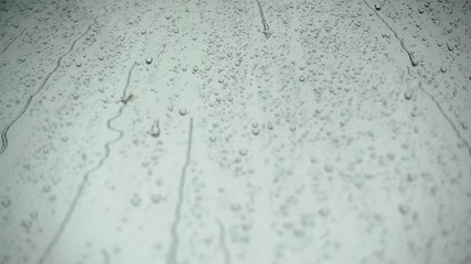 Wall Mural - HD 1080p super slow rain drops on glass texture and backgound	